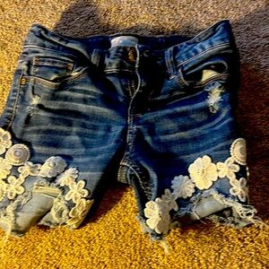 So flower laced jean shorts 8s